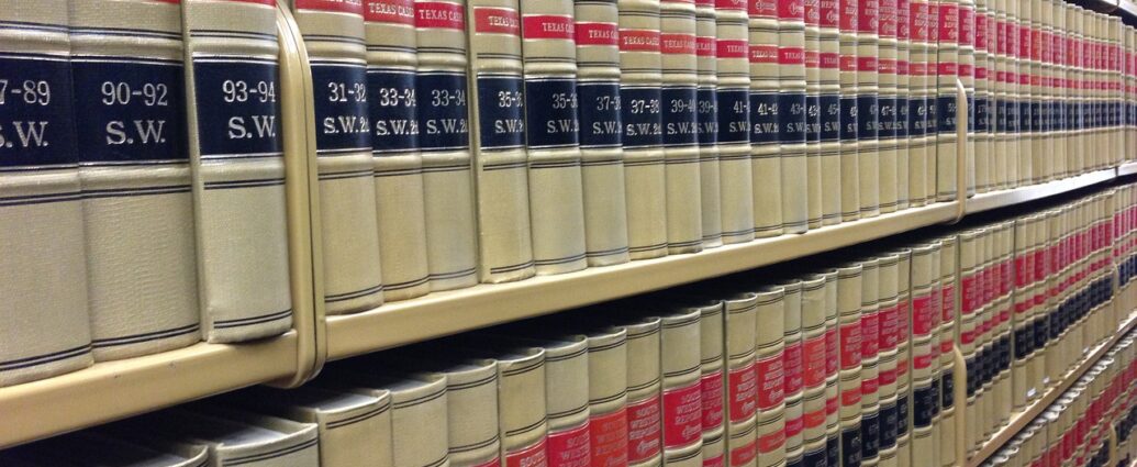 law books, library, rows of books-291676.jpg